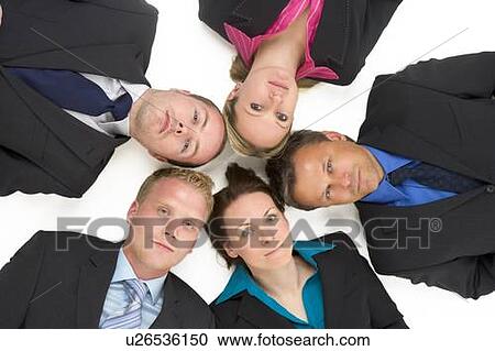 Stock Image - High Angle View Of Business People. Fotosearch