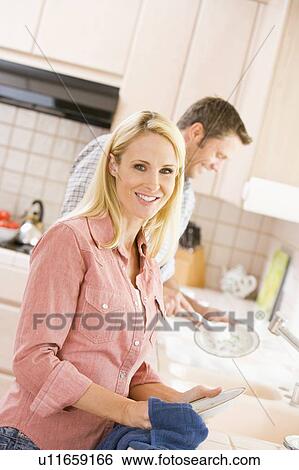 Husband And Wife Doing Dishes View Large Photo Image Stock Photograph - Husband And Wife Doing Dishes. Fotosearch