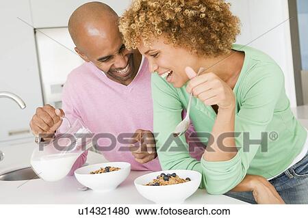 Husband And Wife Eating Breakfast Together View Large Photo Image Stock Image - Husband And Wife Eating Breakfast Together. Fotosearch