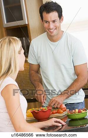 Husband And Wife Preparing Dinner View Large Photo Image Stock Photograph - Husband And Wife Preparing Dinner. Fotosearch