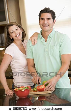 Husband And Wife Preparing meal, mealtime Together View Large Photo Image Stock Image - Husband And Wife Preparing meal, mealtime Together. Fotosearch