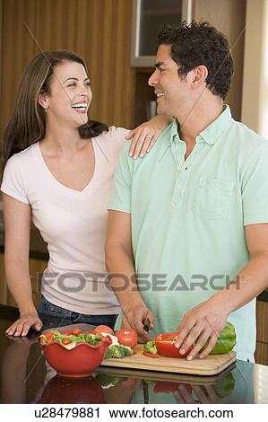 Husband And Wife Preparing meal, mealtime Together View Large Photo Image Stock Image - Husband And Wife Preparing meal, mealtime Together . Fotosearch