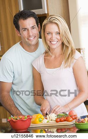 Husband And Wife Preparing meal, mealtime Together View Large Photo Image Stock Photograph - Husband And Wife Preparing meal, mealtime Together. Fotosearch