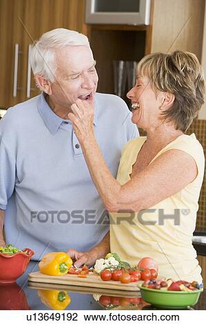 Husband And Wife Preparing Vegetables View Large Photo Image Stock Image - Husband And Wife Preparing Vegetables. Fotosearch