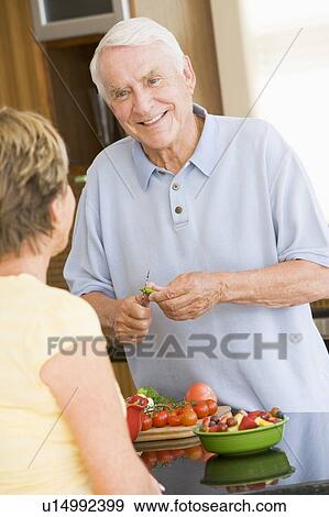 Husband And Wife Preparing Vegetables View Large Photo Image Stock Photo - Husband And Wife Preparing Vegetables. Fotosearch