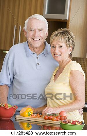 Husband And Wife Preparing Vegetables View Large Photo Image Stock Photo - Husband And Wife Preparing Vegetables. Fotosearch