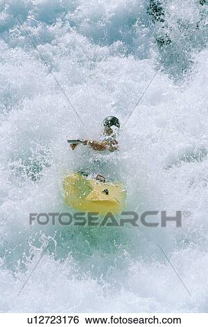 Kayaker rowing in rapids View Large Photo Image Stock Photograph - Kayaker rowing in rapids. Fotosearch