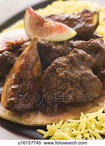 Maans Anjeer - Slow cooked Lamb with Fresh Figs View Large Photo Image Stock Photography - Maans Anjeer - Slow cooked Lamb with Fresh Figs. Fotosearch