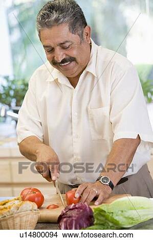 Man Chopping Vegetables View Large Photo Image Picture - Man Chopping Vegetables. Fotosearch