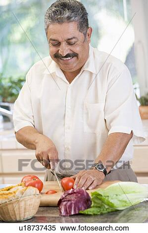 Man Chopping Vegetables View Large Photo Image Stock Photography - Man Chopping Vegetables. Fotosearch