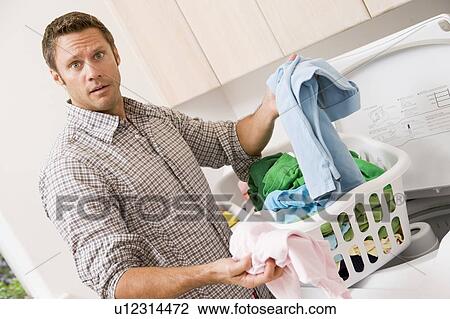 Man Doing Laundry View Large Photo Image Stock Image - Man Doing Laundry . Fotosearch