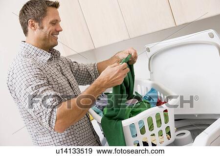 Man Doing Laundry View Large Photo Image Stock Photo - Man Doing Laundry . Fotosearch