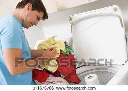 Man Doing Laundry View Large Photo Image Stock Photograph - Man Doing Laundry. Fotosearch
