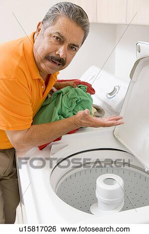 Man Doing Laundry View Large Photo Image Stock Photograph - Man Doing Laundry. Fotosearch