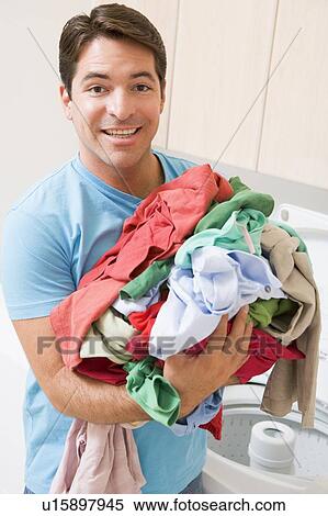 Man Doing Laundry View Large Photo Image Stock Photography - Man Doing Laundry. Fotosearch