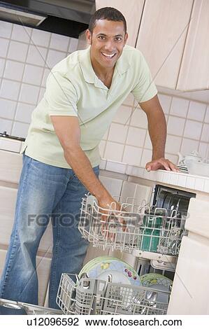 Man Loading Dishwasher View Large Photo Image Stock Image - Man Loading Dishwasher . Fotosearch