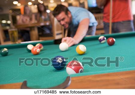 Man playing pool View Large Photo Image Stock Photography - Man playing pool. Fotosearch