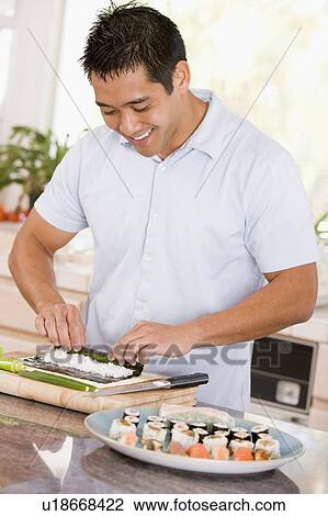 Man Preparing Sushi View Large Photo Image Stock Image - Man Preparing Sushi. Fotosearch