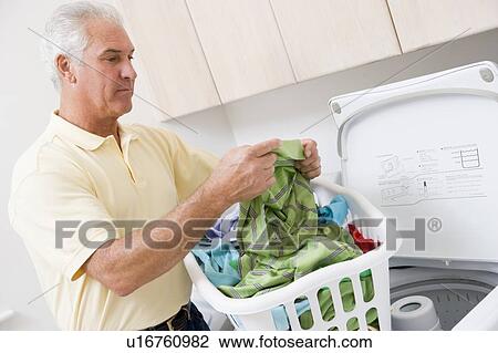 Man Reading Washing Instructions View Large Photo Image Stock Image - Man Reading Washing Instructions. Fotosearch