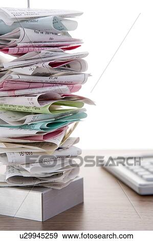Metal Spike File With Bills View Large Photo Image Stock Photo - Metal Spike File With Bills. Fotosearch