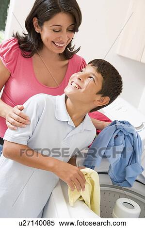 Mother And Son Doing Laundry View Large Photo Image Stock Photography - Mother And Son Doing Laundry. Fotosearch