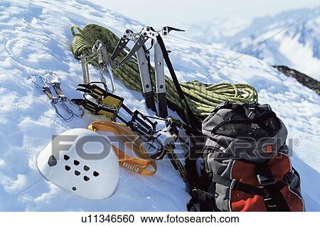 Mountain climbing equipment on a snowy mountain (selective focus) View Large Photo Image Stock Image - Mountain climbing equipment on a snowy mountain (selective focus). Fotosearch