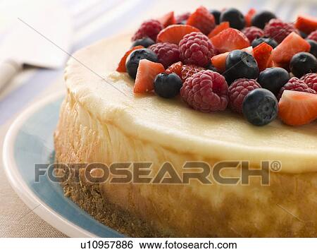 Stock Photograph - New York Cheesecake With Mixed Berries. Fotosearch