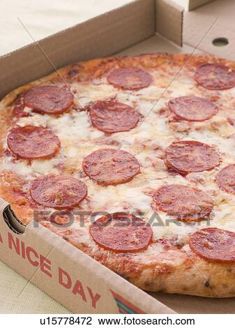 Stock Image - Pepperoni Pizza In A Take Away Box. Fotosearch