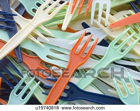 Stock Photo - Pile Of Coloured Plastic Take Away Forks. Fotosearch