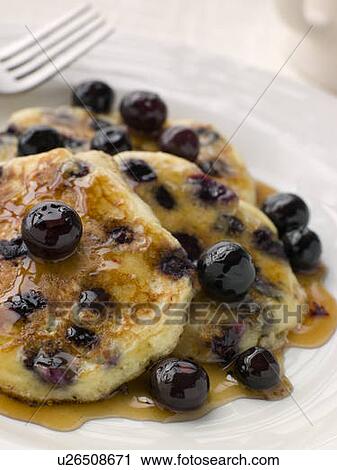 Stock Image - Plate Of Blueberry Pancakes With Maple Syrup. Fotosearch