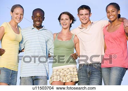 Portrait Of A Group Of Teenagers Outdoors View Large Photo Image Picture - Portrait Of A Group Of Teenagers Outdoors . Fotosearch