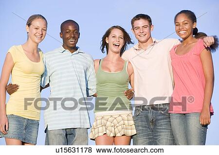 Portrait Of A Group Of Teenagers Outdoors View Large Photo Image Stock Photo - Portrait Of A Group Of Teenagers Outdoors . Fotosearch