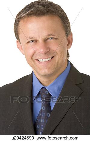 Stock Image - Portrait Of Businessman Smiling . Fotosearch