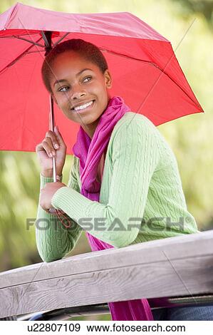 Stock Photo - Portrait Of Teenage Girl Outdoors . Fotosearch