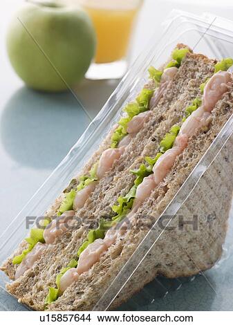 Prawn Marie Rose And Salad Sandwich On Granary Bread With An Apple And Orange Juice View Large Photo Image Picture - Prawn Marie Rose And Salad Sandwich On Granary Bread With An Apple And Orange Juice. Fotosearch
