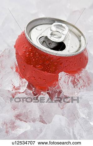 Stock Photo - Red Can Of Fizzy Soft Drink Set In Ice With The Ring Pulled . Fotosearch