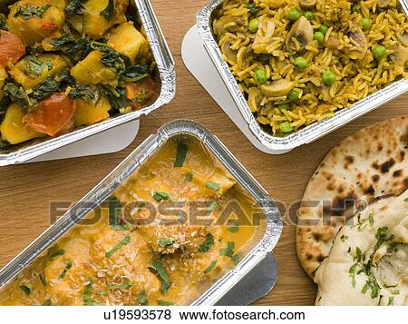 Stock Photo - Selection Indian Take Away Dishes In Foil Containers. Fotosearch