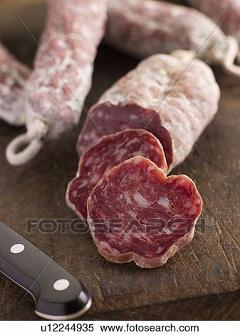 Selection of French Sausages on a cutting board View Large Photo Image Stock Photography - Selection of French Sausages on a cutting board. Fotosearch