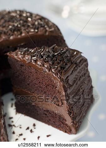 Stock Image - Slice Of Chocolate Fudge Cake. Fotosearch