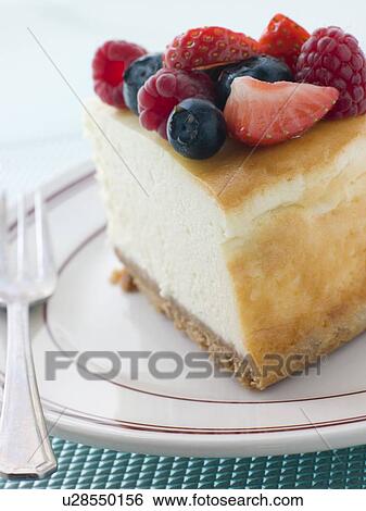 Slice Of New York Cheesecake On A Plate View Large Photo Image Stock Photograph - Slice Of New York Cheesecake On A Plate. Fotosearch