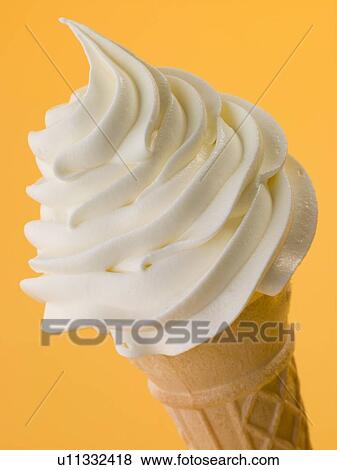 Stock Photo - Soft Whipped Ice Cream In A Wafer Cone. Fotosearch