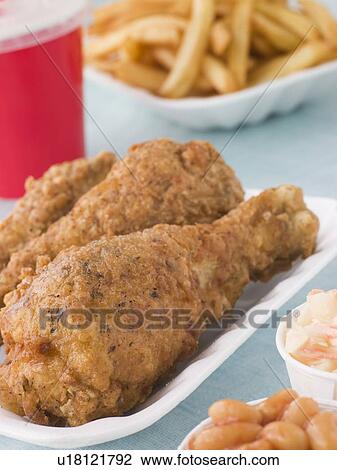 Southern Fried Chicken With Fries, Baked Beans, Coleslaw And A Soft Drink View Large Photo Image Stock Image - Southern Fried Chicken With Fries, Baked Beans, Coleslaw And A Soft Drink. Fotosearch