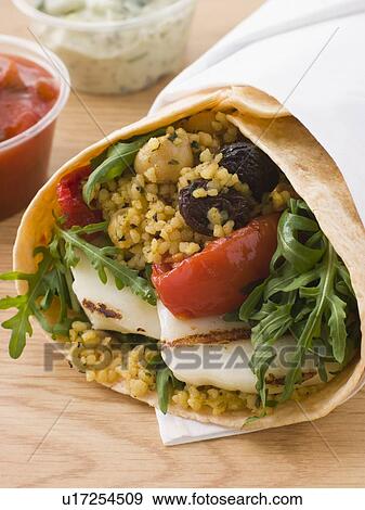 Spiced Cous Cous And Grilled Halloumi Tortilla Wrap View Large Photo Image Stock Photo - Spiced Cous Cous And Grilled Halloumi Tortilla Wrap. Fotosearch