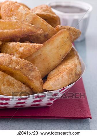 Spiced Potato Wedges With Barbeque Sauce View Large Photo Image Stock Image - Spiced Potato Wedges With Barbeque Sauce. Fotosearch