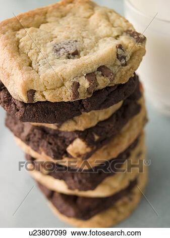 Stack Of Milk And Dark Chocolate Chip Cookies View Large Photo Image Stock Photo - Stack Of Milk And Dark Chocolate Chip Cookies. Fotosearch