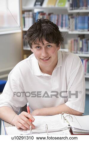 Student writing and studying View Large Photo Image Stock Image - Student writing and studying. Fotosearch
