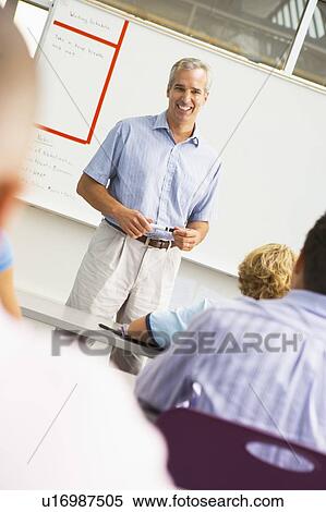 Stock Photography - Students in math class with teacher. Fotosearch