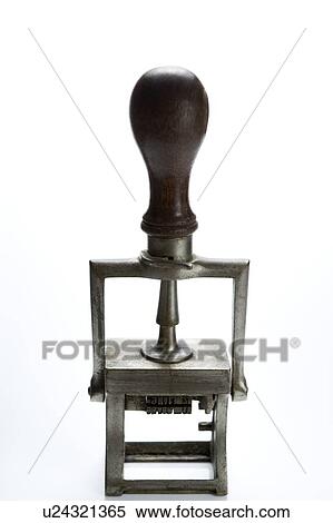 Stock Photography - Studio Shot Of Old Fashioned Rubber Stamp. Fotosearch