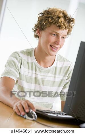 Teenage Boy Using Desktop Computer View Large Photo Image Stock Image - Teenage Boy Using Desktop Computer. Fotosearch