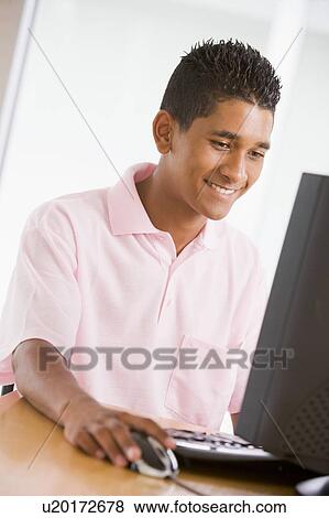 Teenage Boy Using Desktop Computer View Large Photo Image Stock Photo - Teenage Boy Using Desktop Computer. Fotosearch